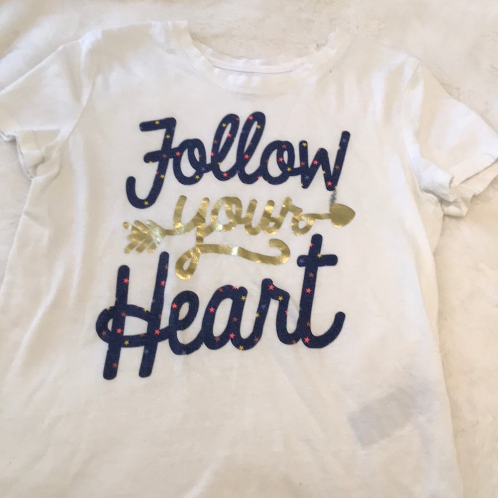 White shirt with colored words